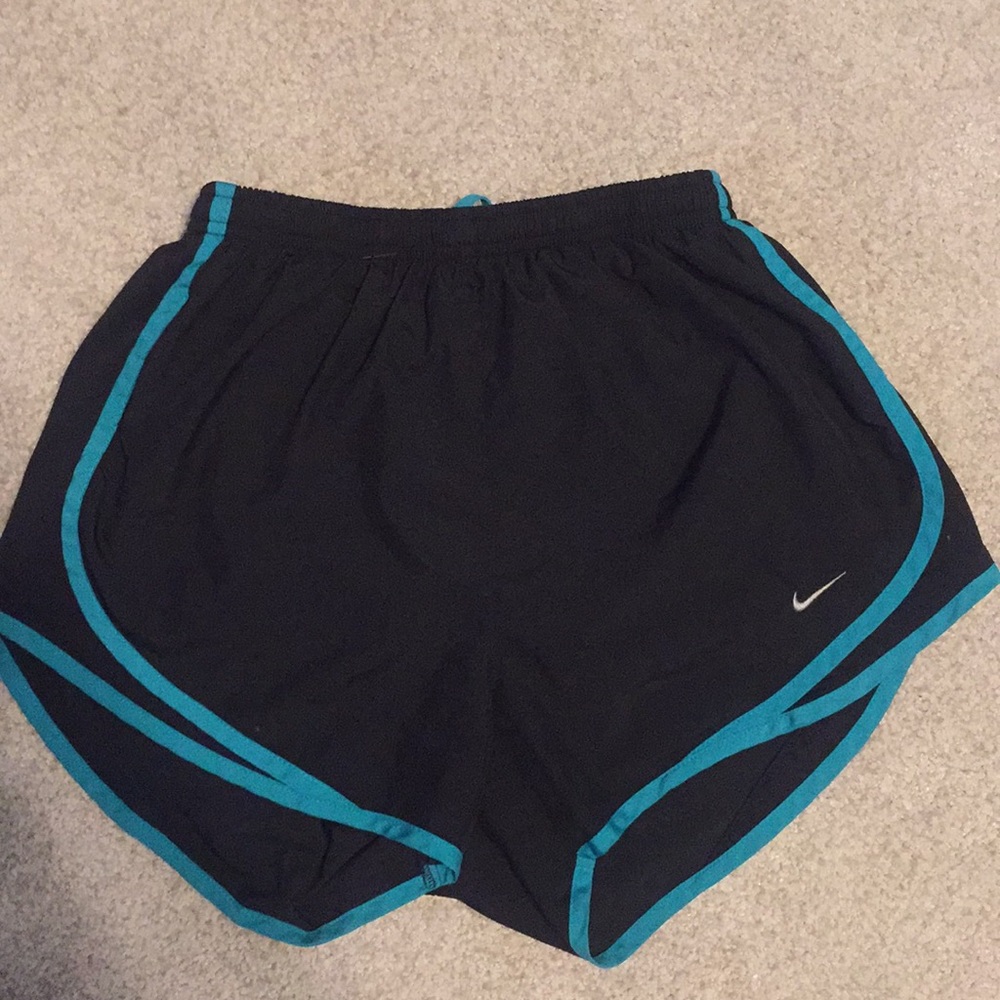Turquoise and black Nike shorts